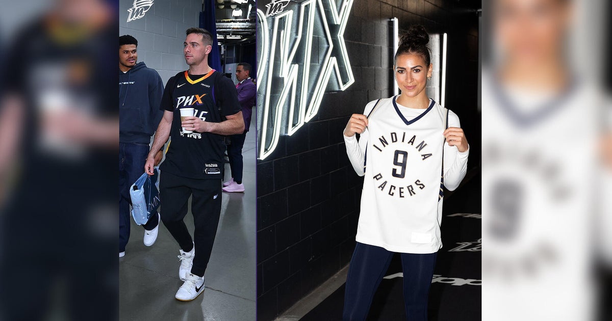 T.J. and Megan McConnell swap jerseys before Game 1 of the NBA Finals 