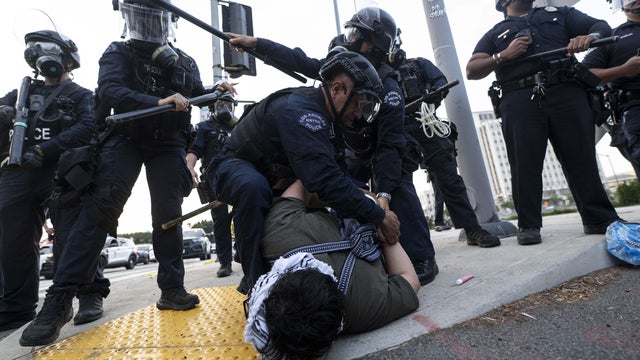 Protesters gather outside of the Federal Building in downtown Los Angeles 