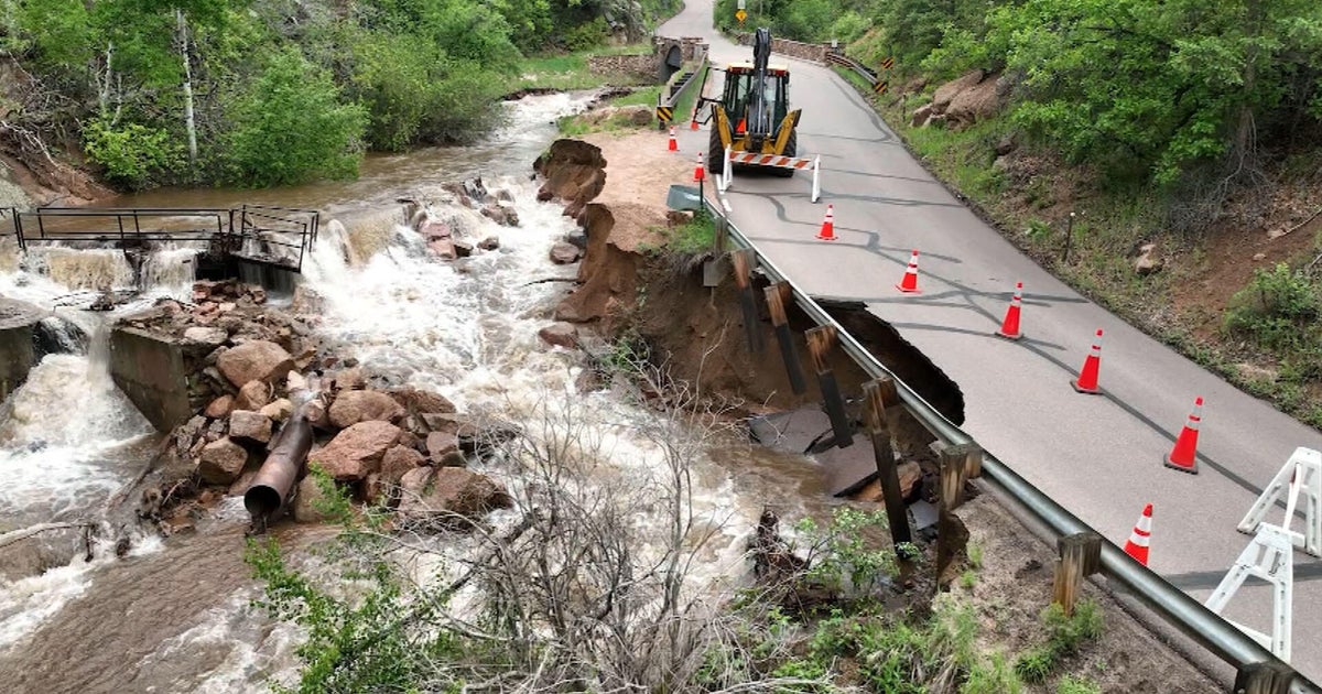 Heavy rain washes out road in foothills west of Colorado Springs Heavy rain washes out road in foothills west of Colorado Springs