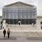 Pedestrians walk in front of the Supreme Court building in Washington, D.C., on Wednesday, May 21, 2025. 