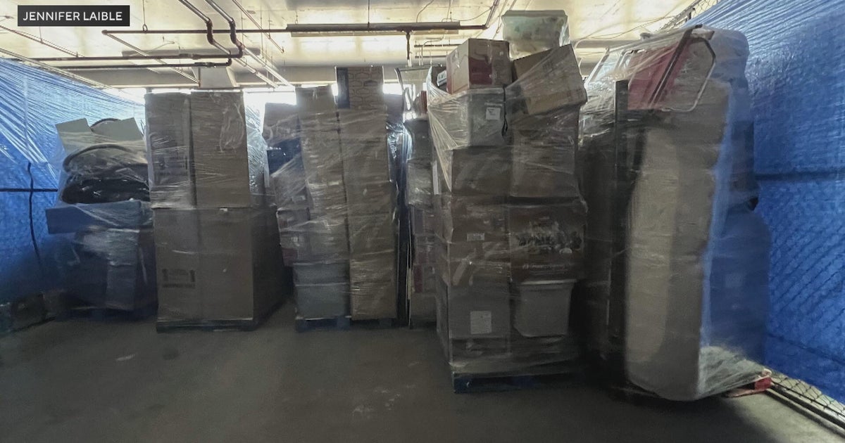 Woman says moving company held family's belongings hostage for months 
