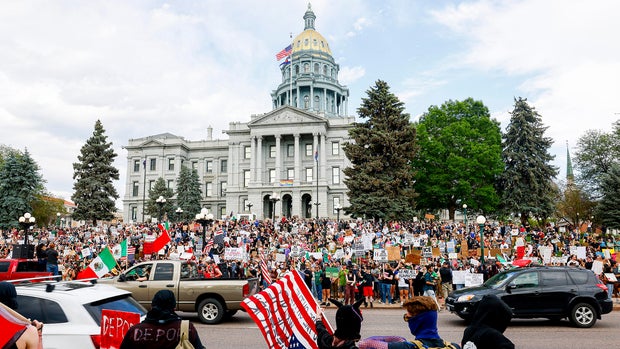 Protesters Gather In Cities Across Nation To Denounce ICE Immigration Raids 