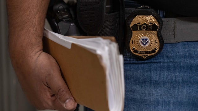 An Immigration and Customs Enforcement (ICE) agent 