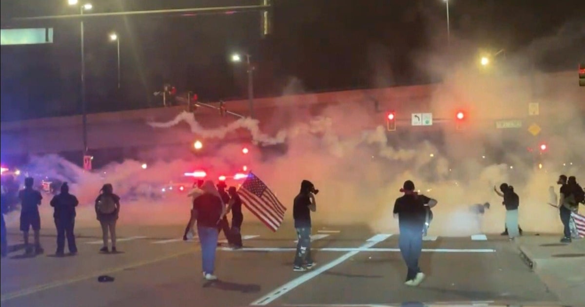 Denver police confront marchers upset with ICE in chaotic exchanges downtown, block group from accessing I-25