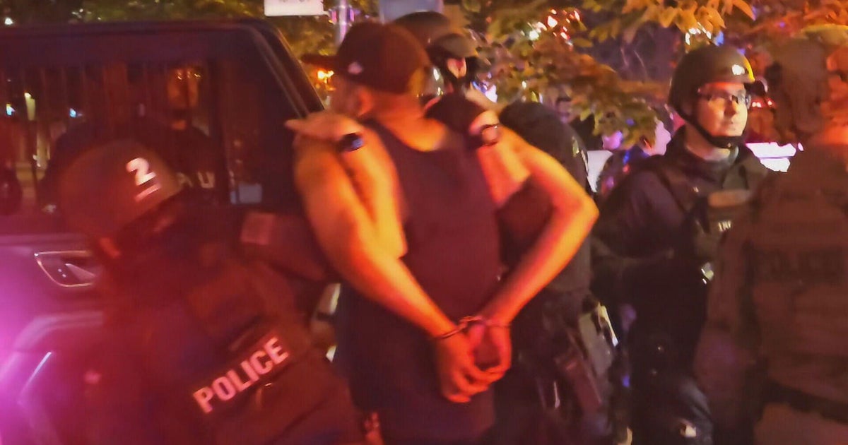 Denver police arrest several marchers during demonstration over ICE raids 