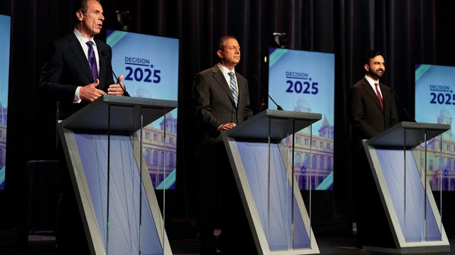 Andrew Cuomo and Zohran Mamdani during a debate 