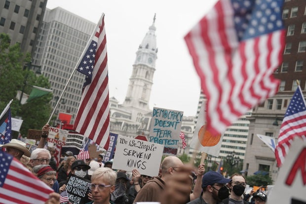 Demonstrators gather for the