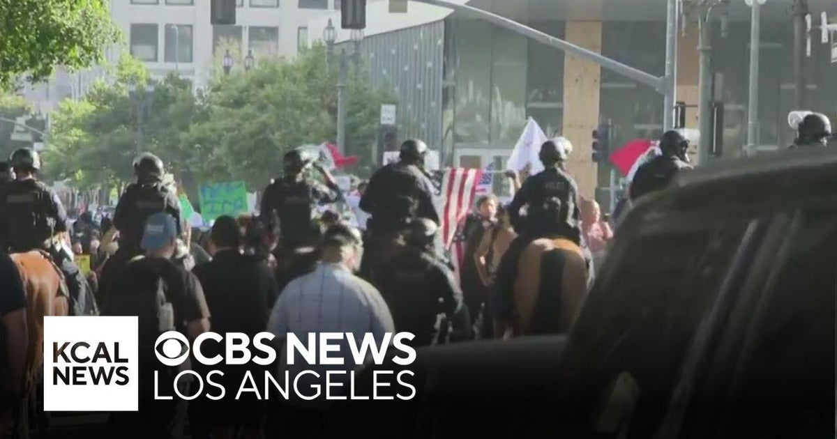 LAPD uses horses to disperse protesters from downtown Los Angeles - CBS ...