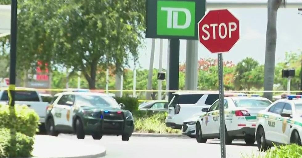 Large police investigation at TD Bank parking lot in southwest Miami-Dade