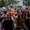 Spaniards shoot water guns at visitors in protest against mass tourism