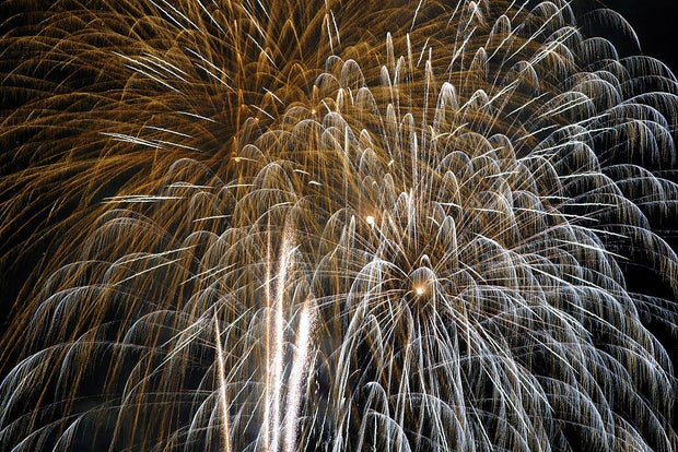 BOULDER, CO - July 4, 2003 - Fireworks explode over CU-Boulder's Folsom Field <cq>during the annual Fourth of July celebration Friday evening, 7/4/03, presented by KBCO-FM and Wright Kingdom Realtors <cq>. The ceremony included a community sing-a-long, fl 