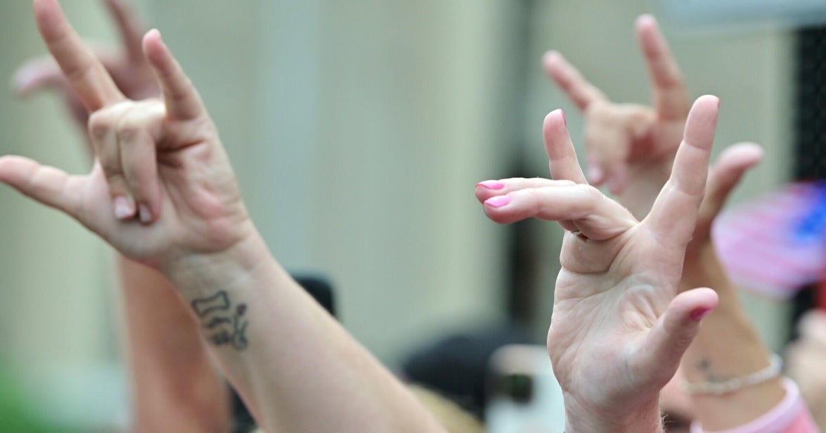 Why Karen Read and her supporters are communicating with a hand gesture 
