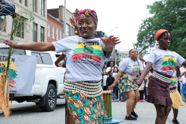 The Dwennimmen African Dance Community performs in front of