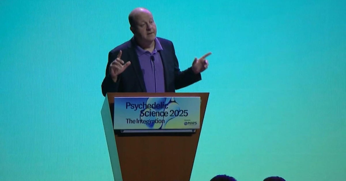 Polis announces pardons at psychedelics conference 