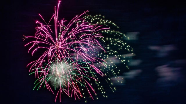 Fireworks, celebrating USA Independence Day, July 4 in Colorado under the edge of Pikes Peak forest 