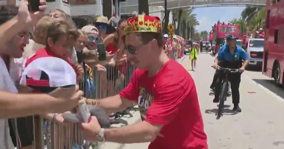 Panthers’ Brad Marchand takes time to sign autographs on the parade route