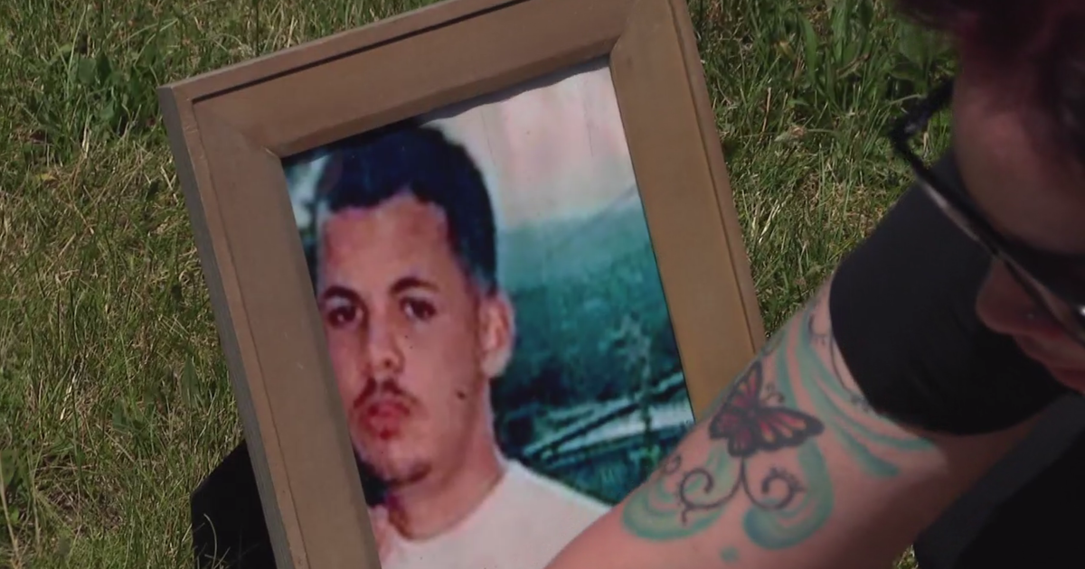 Sisters visit suburban Chicago gravesite of brother who had been missing for nearly 2 decades 