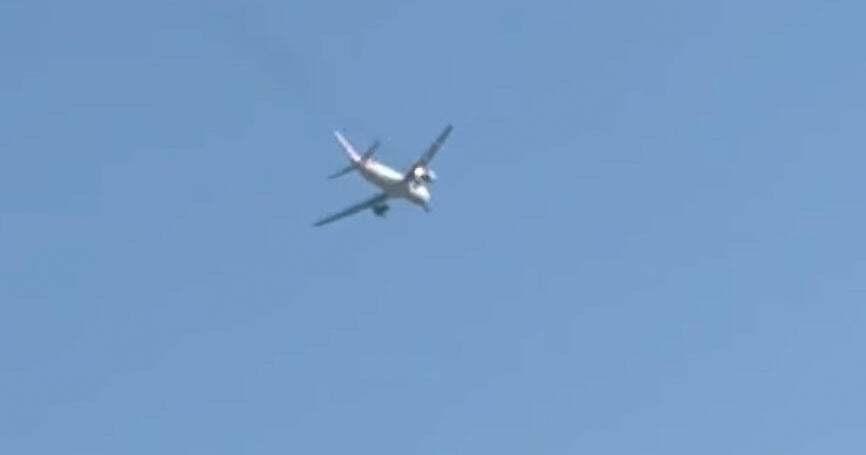Flight returns to Las Vegas airport after flames come from engine midair 