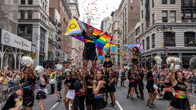 New Yorkers celebrate during the annual Pride March into the West Village on June 30, 2024 in New York City. 
