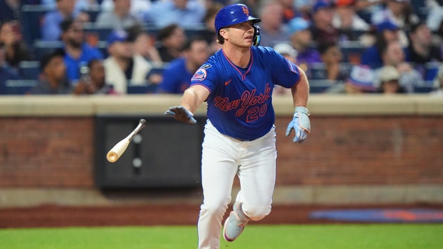 New York Mets' Pete Alonso tosses his bat as he runs for a single during the fourth inning of a baseball game against the Atlanta Braves Thursday, June 26, 2025, in New York. 
