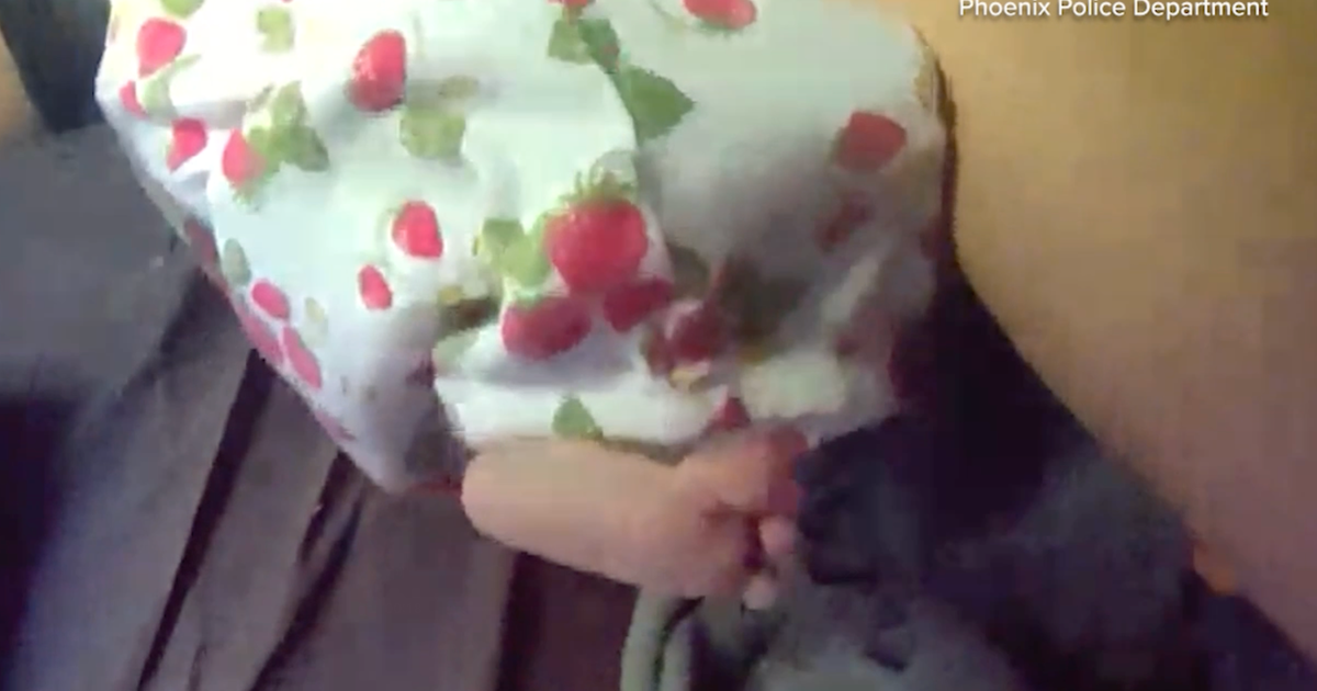 Video shows Arizona police rescuing baby left alone for days