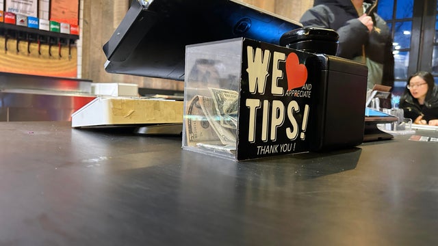 We appreciate Tips, Thank you, tips jar in Mighty Quinns BBQ restaurant, Queens, New York 