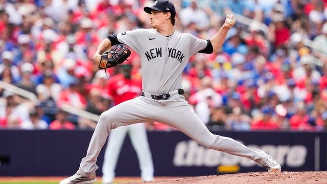 Max Fried #54 of the New York Yankees pitches against the Toronto Blue Jays during the first inning in their MLB game at the Rogers Centre on July 1, 2025 in Toronto, Ontario, Canada. 