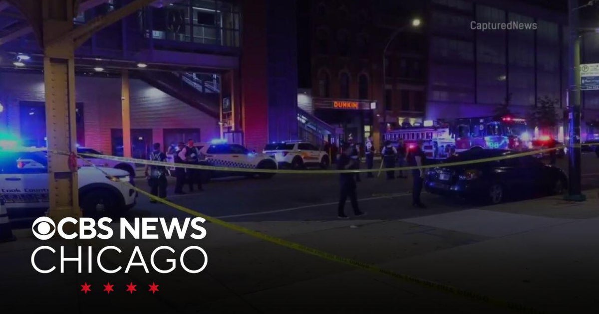A crime scene tape marks the site where creativity met violence outside the Artis Lounge.