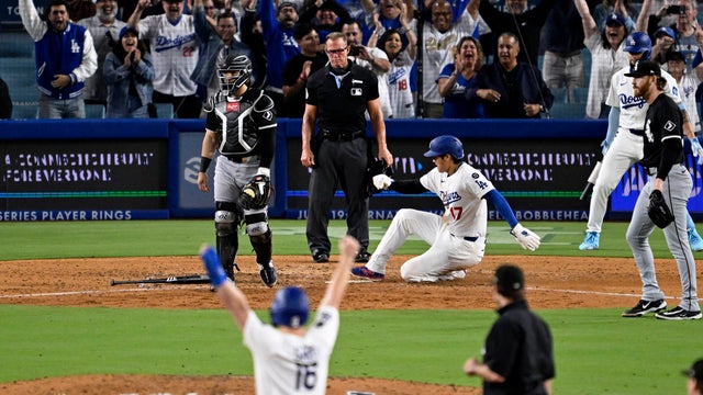 Los Angeles Dodgers defeated the Chicago White Sox 5-4 to win a baseball game. 