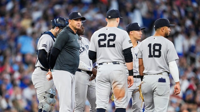 Manager Aaron Boone of the New York Yankees looks on during a pitching change in the fifth inning against the Toronto Blue Jays at Rogers Centre on July 3, 2025 in Toronto, Ontario, Canada. 