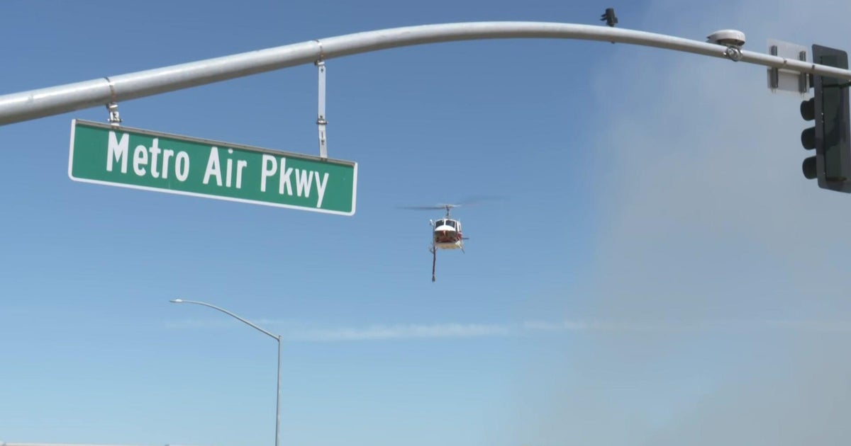 Sacramento-area fire crews battling large brush fire on Metro Air Parkway 