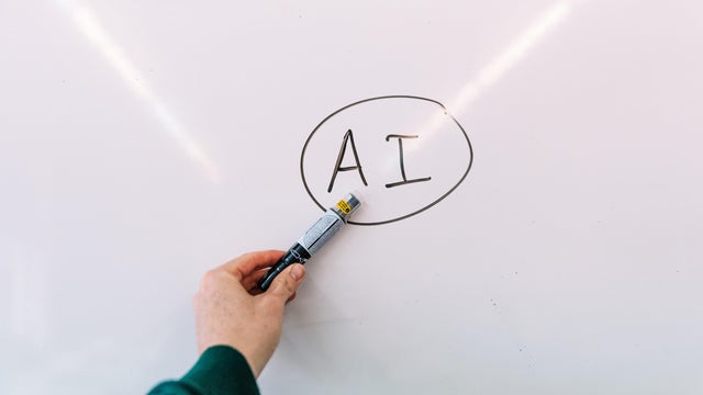 Young girl uses AI virtual assistant to do schoolwork 