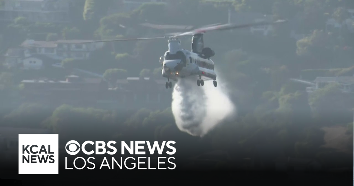Helicopters drop water to extinguish the Rancho Fire - CBS Los Angeles