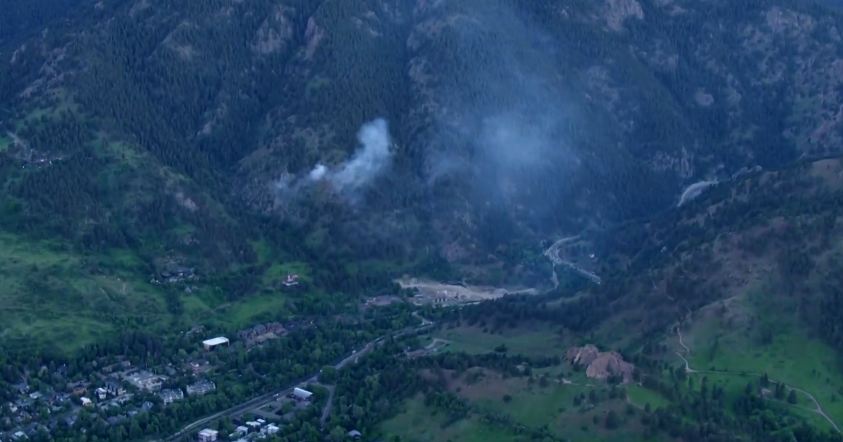 Woman faces charges 3 weeks after fire near Flagstaff Mountain 