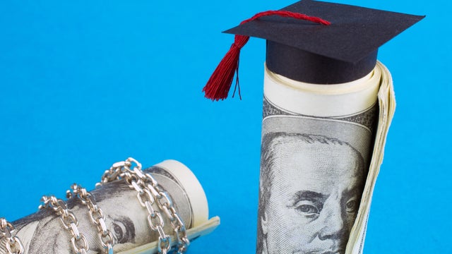 roll of dollars tied on a chain 
