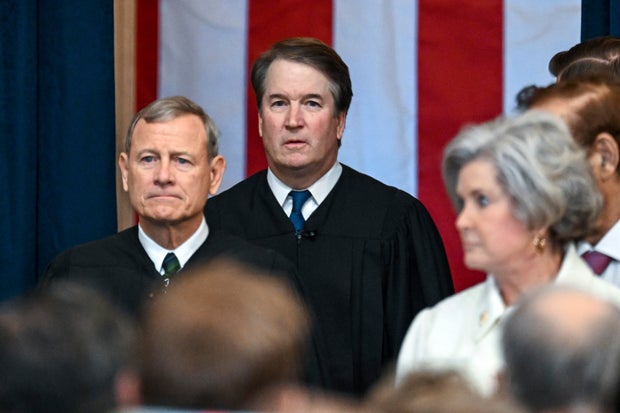 Supreme Court Chief Justice John Roberts, left, and Justice Brett Kavanaugh arrive before President Trump's inauguration in the Rotunda of the U.S. Capitol on Monday, Jan. 20, 2025.