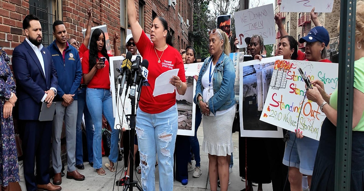 6 months after massive Bronx fire, displaced residents rally for building repairs 