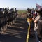 Migrants hide from ICE agents after farm raid, clash with protesters