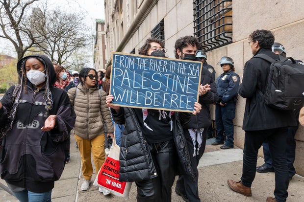 Students and pro-Palestinian activists gather outside of Columbia University to protest the university's stance on Israel on April 18, 2024 in New York City. 