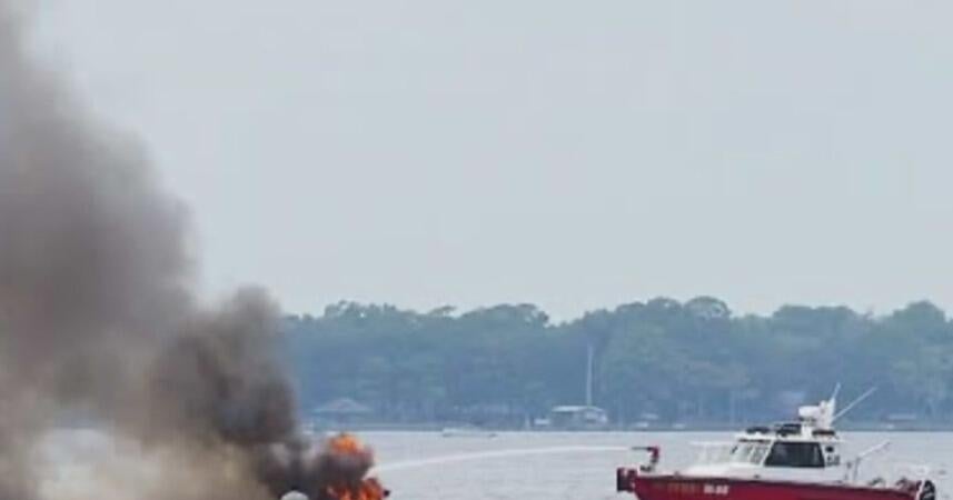 Father, son rescue family of 5 from burning boat off Jacksonville