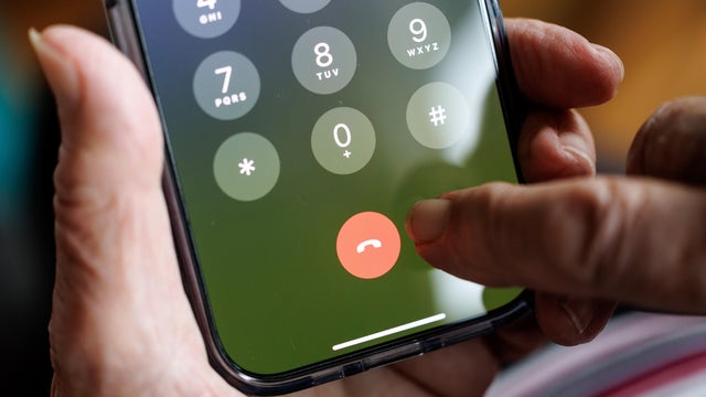Elderly lady on the phone with a smartphone 