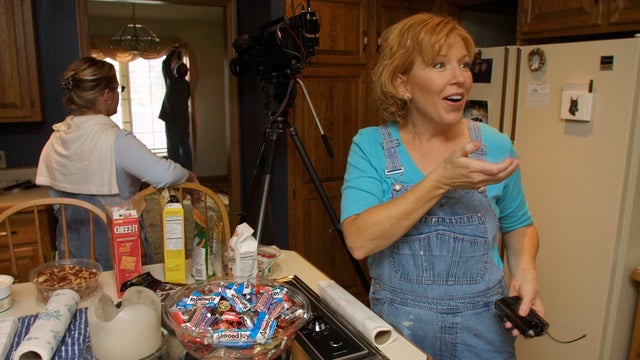 IN THIS PHOTO: Plymouth, MN., 10/9/2001.  Decorating Cents host Joan Steffend talked with camerman Cary Strandjord during a break in filming at a room makeover in Plymouth.  Behind the scenes look at local show Decorating Cents on HGTV. Joan Steffend is t 