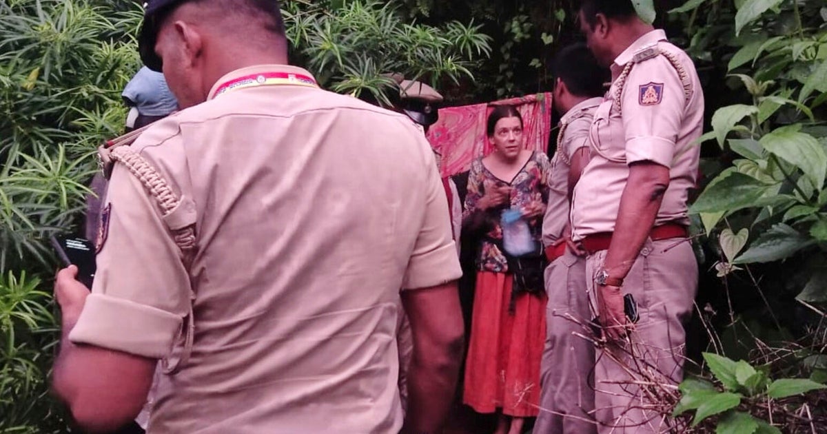 Russian mom and 2 young girls found living inside remote cave in snake-infested forest in India Russian mom and 2 young girls found living inside remote cave in snake-infested forest in India