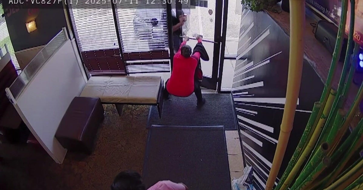 Video shows man firing into St. Paul cafe amid police shootout 