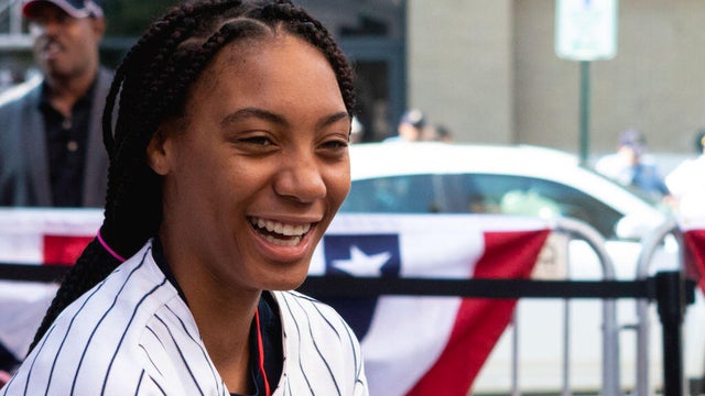Mo'ne Davis, player on the Anderson Monarchs Little League Baseball team, attends the Major League Baseball (MLB) unveiling of a mural honoring Negro League Baseball and players in Washington, D.C., in 2018. 