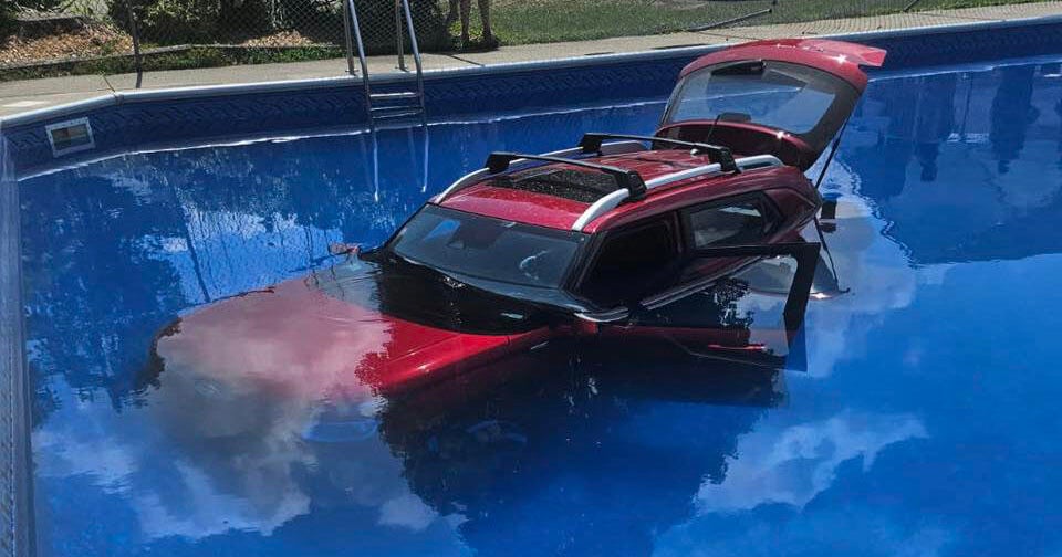Car drives into campground pool, narrowly missing swimmers 
