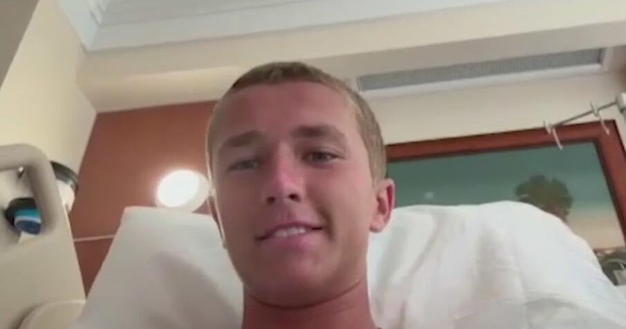 Surf instructor yanked off board, bitten by shark off Florida beach