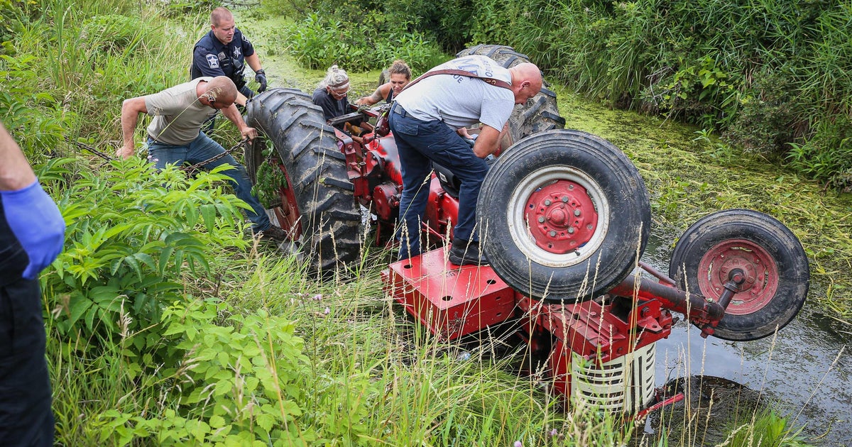 Man gets trapped under tractor in water near Harvard, Illinois 