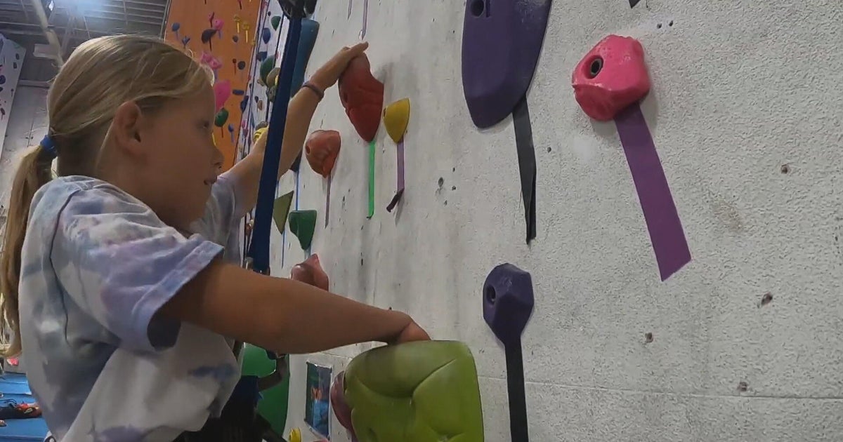 Rock climbing camp empowers kids with limb differences to reach new heights 