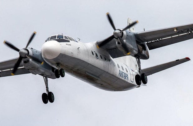 FILE PHOTO: An An-24 aircraft of Angara Airlines lands at the airport of Irkutsk 